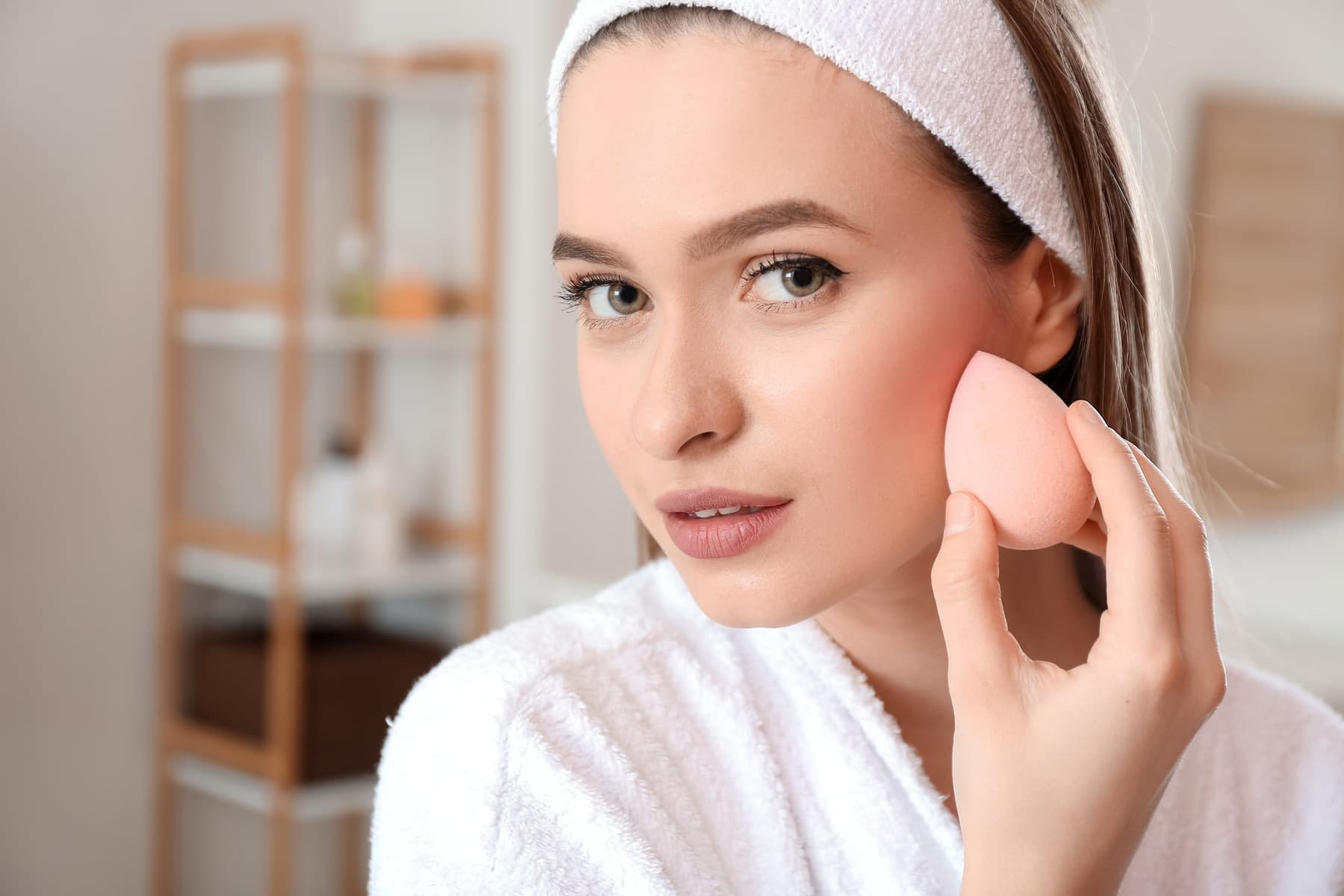 Makeup artist blending a natural daytime base